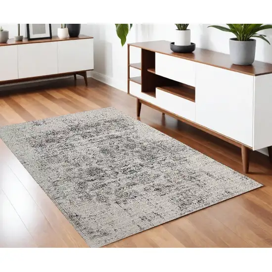 Gray and Black Oriental Power Loom Distressed Area Rug Photo 1