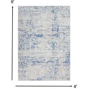 Photo of Gray and Blue Abstract Grids Area Rug