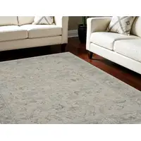 Photo of Gray and Blue Floral Power Loom Area Rug