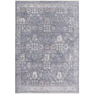 Photo of Gray and Blue Floral Power Loom Worn Faded Area Rug With Fringe