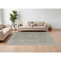 Photo of Gray and Blue Wool Floral Hand Knotted Area Rug