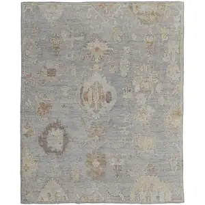 Photo of Gray and Blue Wool Floral Hand Knotted Area Rug