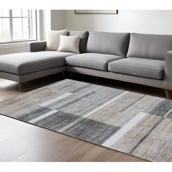 Gray and Brown Abstract Area Rug Photo 1