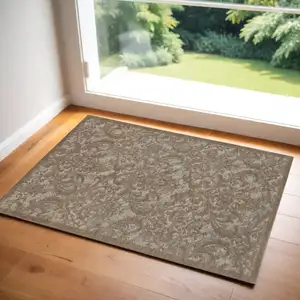 Photo of Gray and Brown Damask Distressed Area Rug