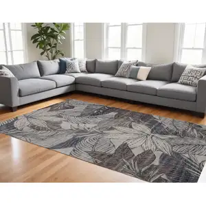 Photo of Gray and Brown Floral Distressed Area Rug