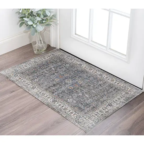 Ivory Charcoal and Orange Oriental Power Loom Area Rug Photo 1