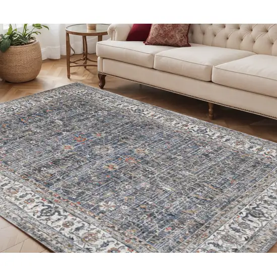 Ivory Charcoal and Orange Oriental Power Loom Area Rug Photo 1