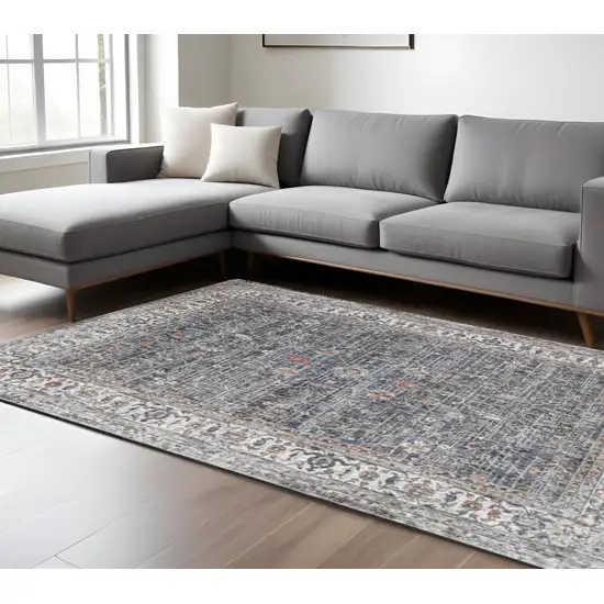 Ivory Charcoal and Orange Oriental Power Loom Area Rug Photo 1