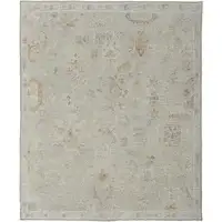 Photo of Gray and Brown Wool Floral Hand Knotted Area Rug