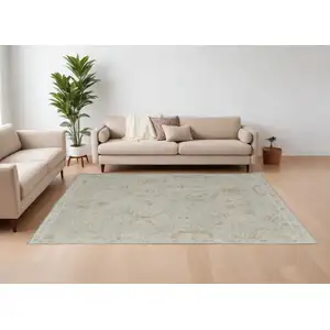 Photo of Gray and Brown Wool Floral Hand Knotted Area Rug