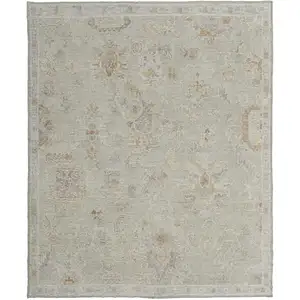 Photo of Gray and Brown Wool Floral Hand Knotted Area Rug