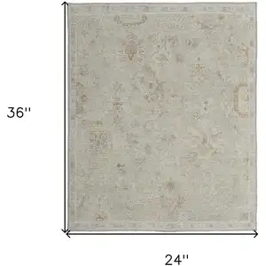 Photo of Gray and Brown Wool Floral Hand Knotted Area Rug