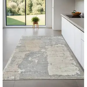 Photo of Gray and Cream Abstract Distressed Area Rug