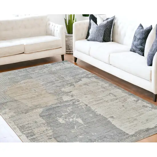 Gray and Cream Abstract Distressed Area Rug Photo 1