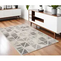 Photo of Gray and Cream Geometric Distressed Area Rug