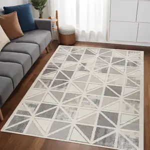 Photo of Gray and Cream Geometric Distressed Area Rug