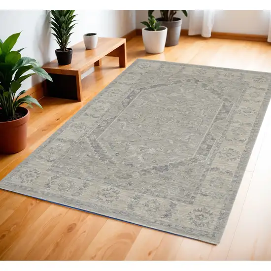 Gray and Dark Gray Floral Medallion Power Loom Area Rug Photo 1