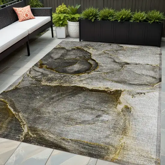 Gray and Gold Abstract Washable Non Skid Indoor Outdoor Area Rug Photo 1