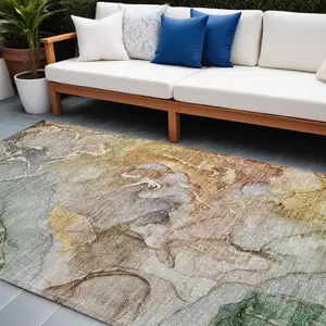 Photo of Gray and Gold Abstract Washable Non Skid Indoor Outdoor Area Rug