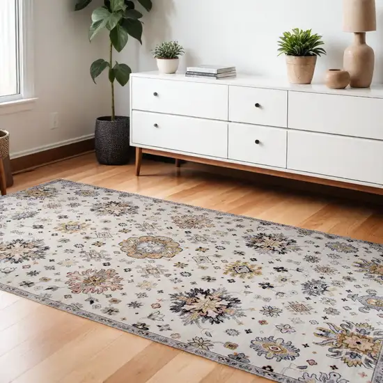 Gray and Gold Floral Area Rug Photo 1