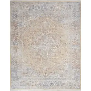 Photo of Gray and Gold Oriental Power Loom Distressed Area Rug With Fringe