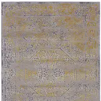 Photo of Gray and Gold Oriental Power Loom Worn Faded Area Rug