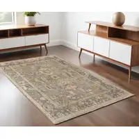 Photo of Gray and Gold Wool Oriental Hand Knotted Area Rug With Fringe