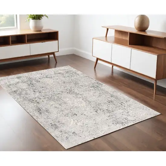 Gray and Ivory Abstract Power Loom Area Rug Photo 1