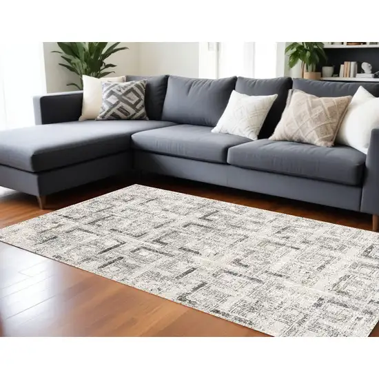 Gray and Ivory Abstract Power Loom Area Rug Photo 1