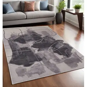 Photo of Gray and Ivory Abstract Hand Tufted Area Rug