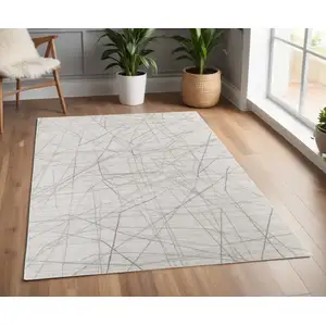 Photo of Gray and Ivory Abstract Hand Woven Area Rug