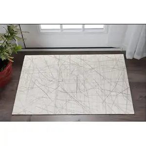 Photo of Gray and Ivory Abstract Hand Woven Area Rug