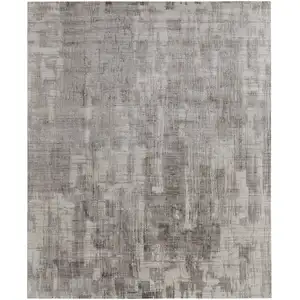 Photo of Gray and Ivory Abstract Hand Woven Worn Faded Area Rug