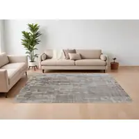 Photo of Gray and Ivory Abstract Hand Woven Worn Faded Area Rug