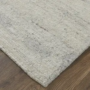 Photo of Gray and Ivory Abstract Hand Woven Worn Faded Area Rug