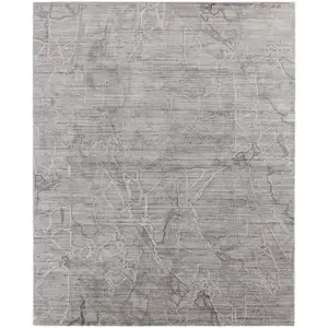 Photo of Gray and Ivory Abstract Hand Woven Worn Faded Area Rug