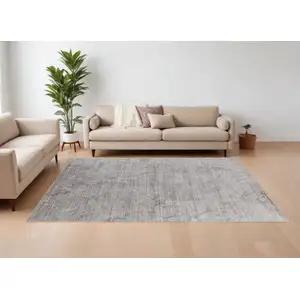 Photo of Gray and Ivory Abstract Hand Woven Worn Faded Area Rug