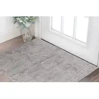 Photo of Gray and Ivory Abstract Hand Woven Worn Faded Area Rug