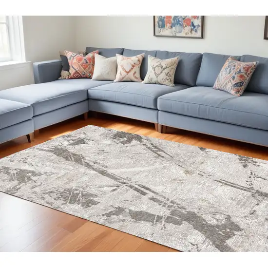 Gray and Ivory Abstract Power Loom Area Rug Photo 1