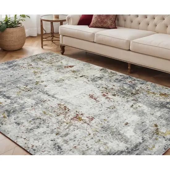 Ivory Gray and Gold Abstract Power Loom Area Rug Photo 1