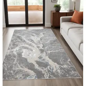 Photo of Gray and Ivory Abstract Power Loom Area Rug