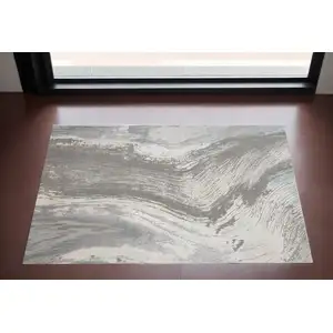 Photo of Gray and Ivory Abstract Power Loom Area Rug