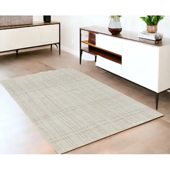 Gray and Ivory Abstract Power Loom Area Rug Photo 1