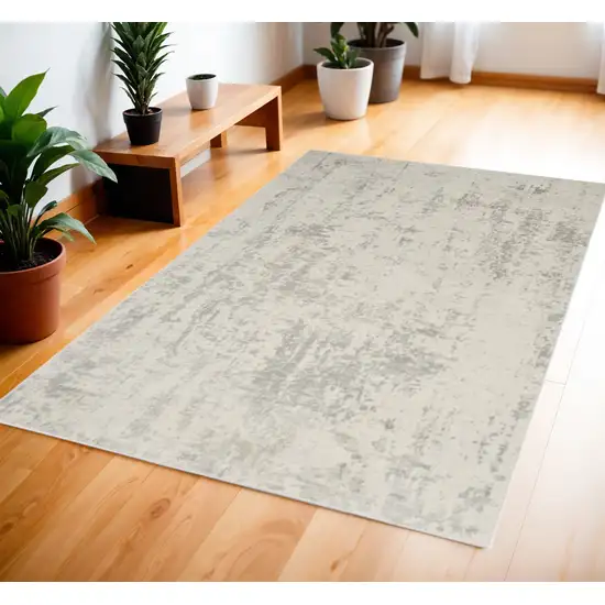 Gray and Ivory Abstract Power Loom Area Rug Photo 1