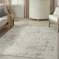 Photo of Gray and Ivory Abstract Power Loom Area Rug