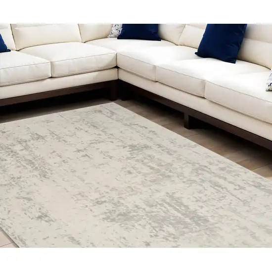 Gray and Ivory Abstract Power Loom Area Rug Photo 1