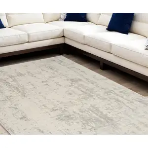 Photo of Gray and Ivory Abstract Power Loom Area Rug