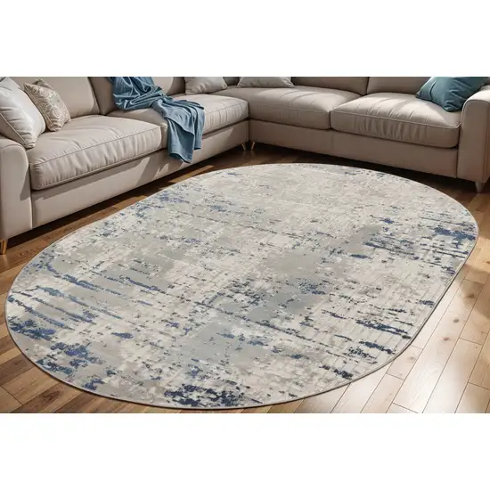 Gray and Ivory Abstract Power Loom Area Rug Photo 1