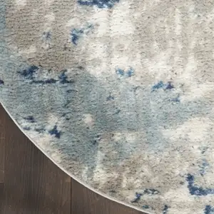 Photo of Gray and Ivory Abstract Power Loom Area Rug