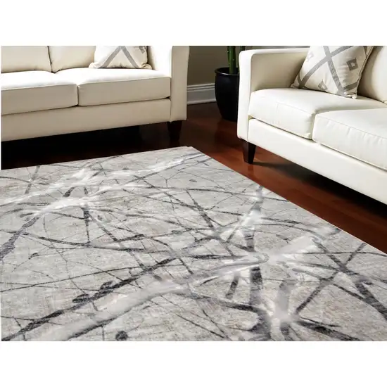 Gray and Ivory Abstract Power Loom Area Rug Photo 1